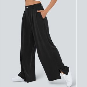Halara High Waisted Zipper Pocket Hem Wide Leg pant in black denim XSP